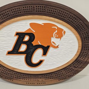 Custom wooden cribbage board with inlaid BC Lions team emblem and lion mascot